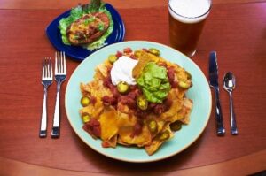 Image Legends Restaurant - Loaded Baked Potato and Nachos at The Penn Stater Hotel